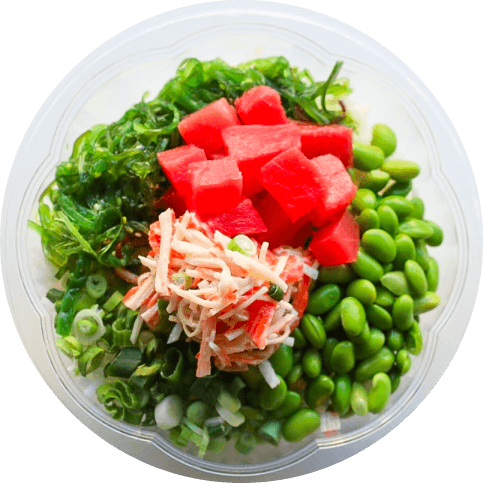 Plenty Poke Bowl, Poke bowl with tuna, shrimp, scallions, edamame, and seaweed salad, topped with poke bowl house sauce and shredded nori, presented on a clear plate.